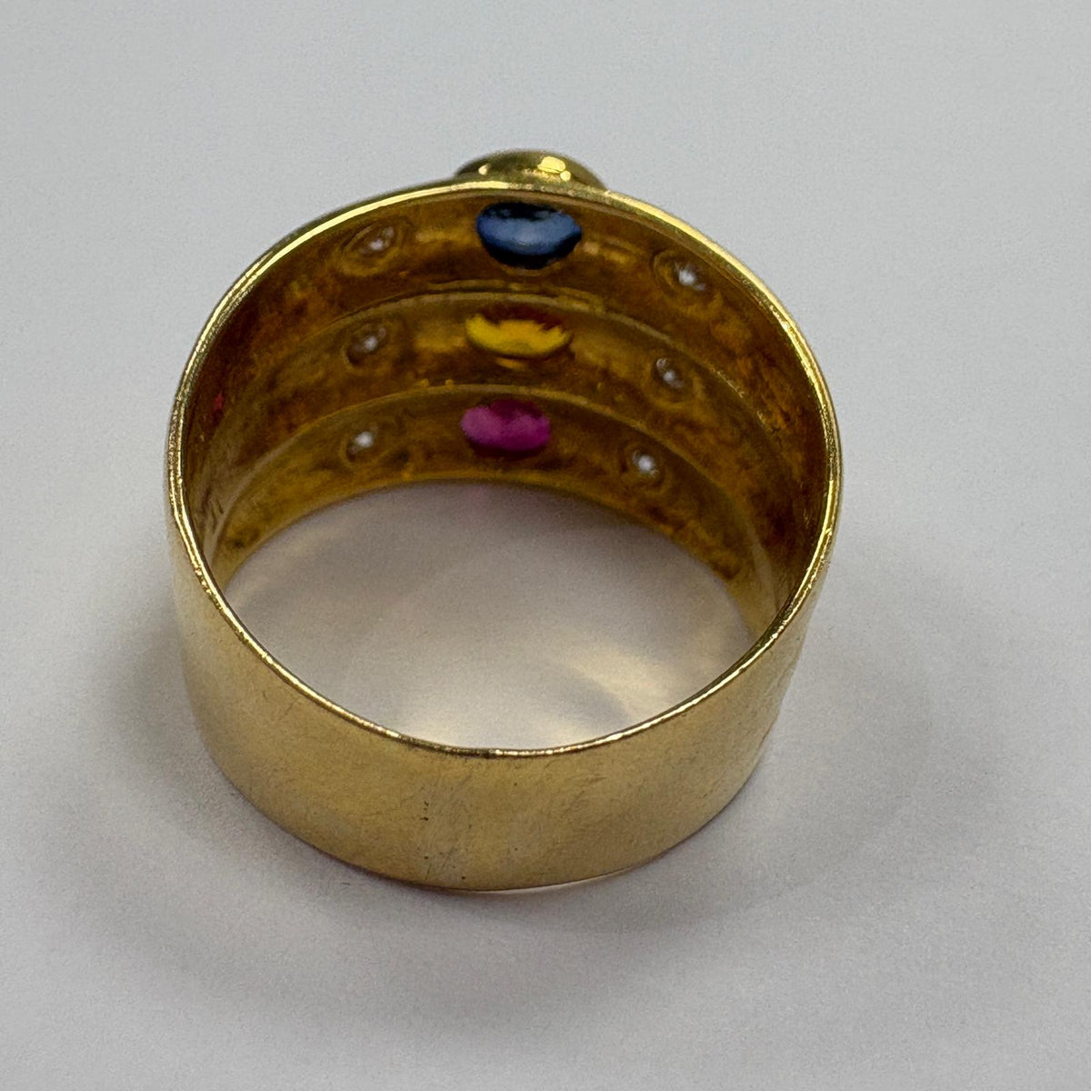 multi gem ring, ruby sapphire citrine ring, 18ct gold statement ring, triple band ring UK, wide gold gemstone ring, cocktail ring gold, pre-loved gemstone ring, birthstone family ring
