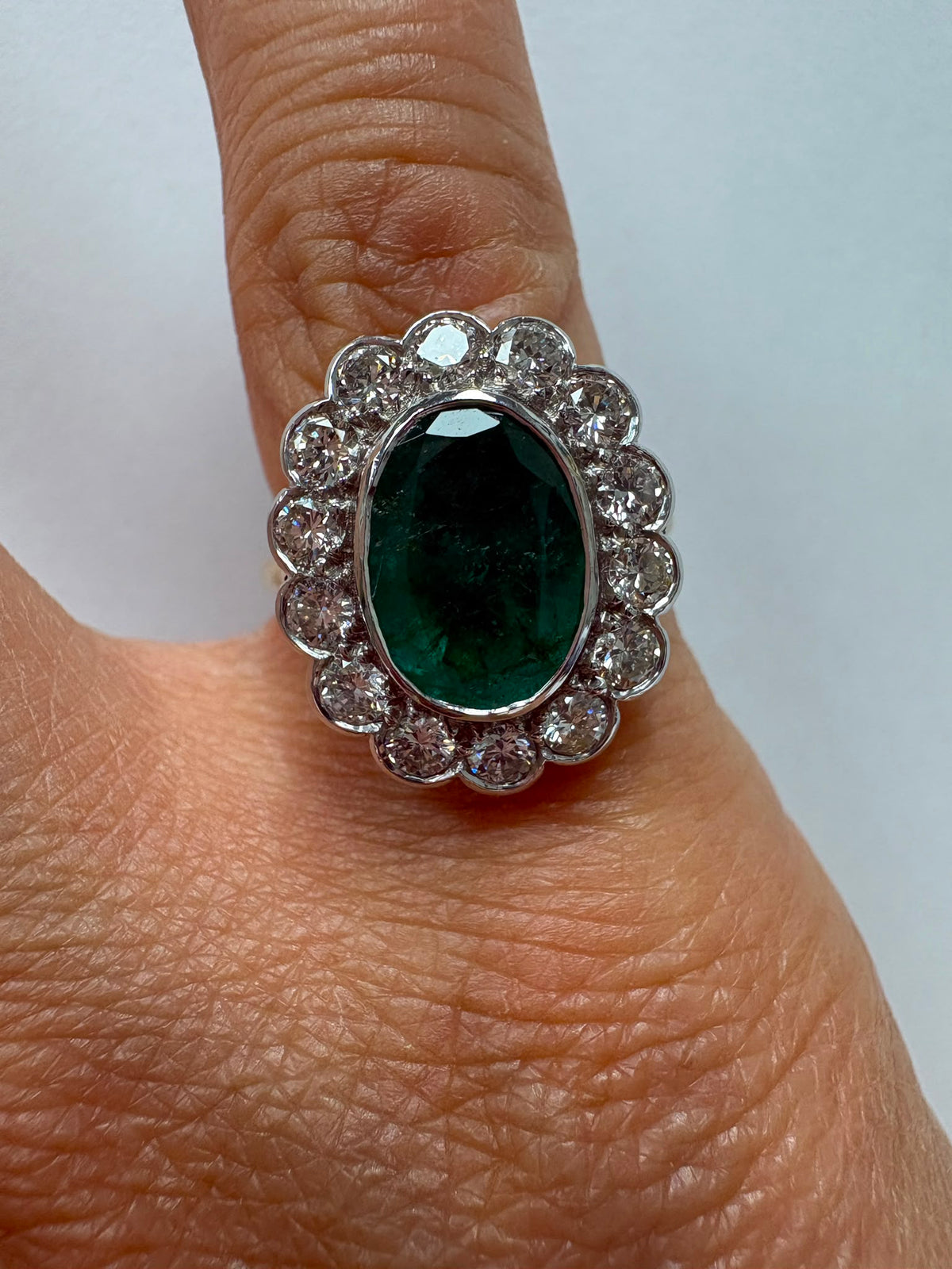 Substantial emerald and diamond cluster ring, 2.40ct emerald, 0.98ct diamonds, 18ct gold, size N. Pre-loved, excellent condition. Visit our Harrogate showroom.