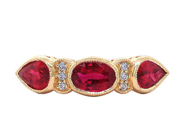Oval and pear ruby and diamond ring alternative engagement ring eternity ring yellow gold Harrogate jewellers Fogal and barnes 