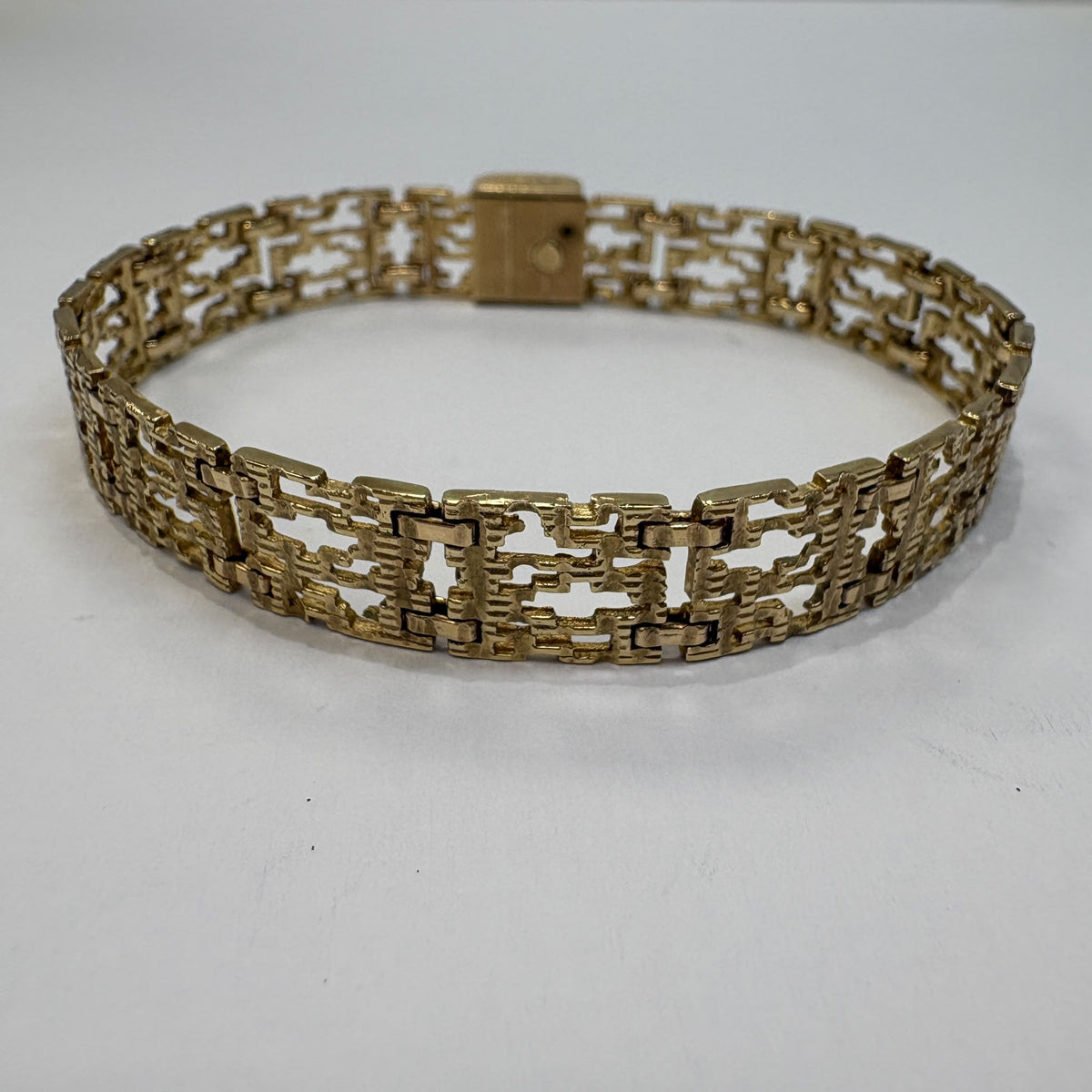 vintage 1970s gold bracelet, brutalist gold bracelet, modernist gold bracelet UK, 9ct gold panel bracelet, vintage textured gold bracelet, pre-loved gold bracelet, retro gold bracelet, statement gold bracelet