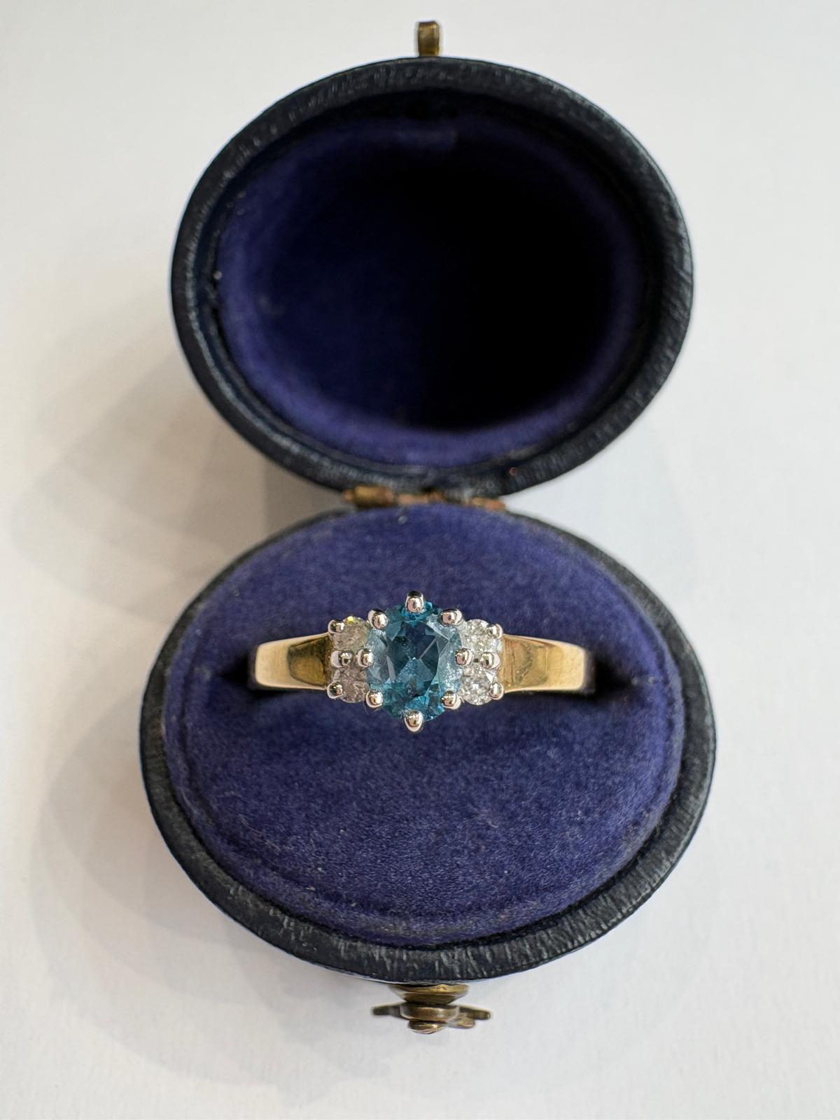 blue topaz ring, blue topaz and diamond ring, second hand blue topaz ring UK, pre-loved topaz ring, vintage blue topaz ring, 9ct gold topaz ring, topaz cluster ring, second hand jewellery Harrogate, second hand jewellery Leeds, second hand jewellery York, second hand jewellery Yorkshire, pre-owned gemstone ring UK, antique blue topaz ring, blue gemstone ring, buy second hand topaz ring, topaz ring size M, blue topaz ring near me, fine jewellery Harrogate, pre-loved jewellery Yorkshire, December birthstone r