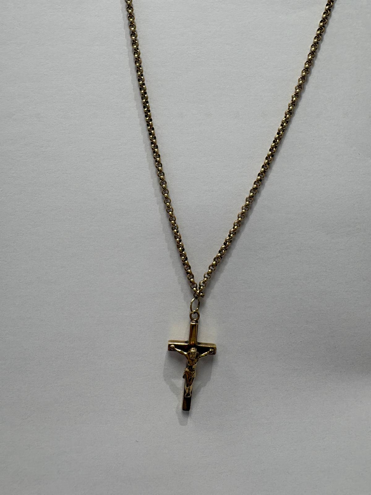 Full length angled view of a yellow gold belcher chain necklace with a yellow gold crucifix pendant.  The chunky round belcher links of the chain are clearly shown.