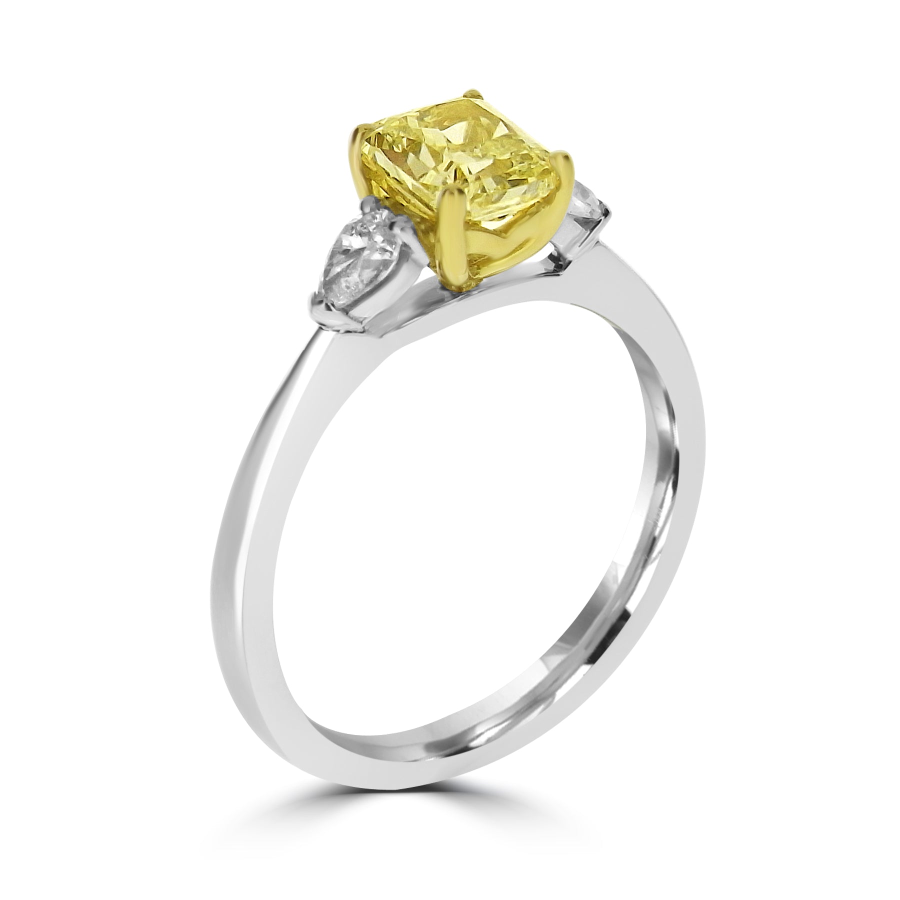 Ring with a yellow diamond and smaller clear stones on a white background