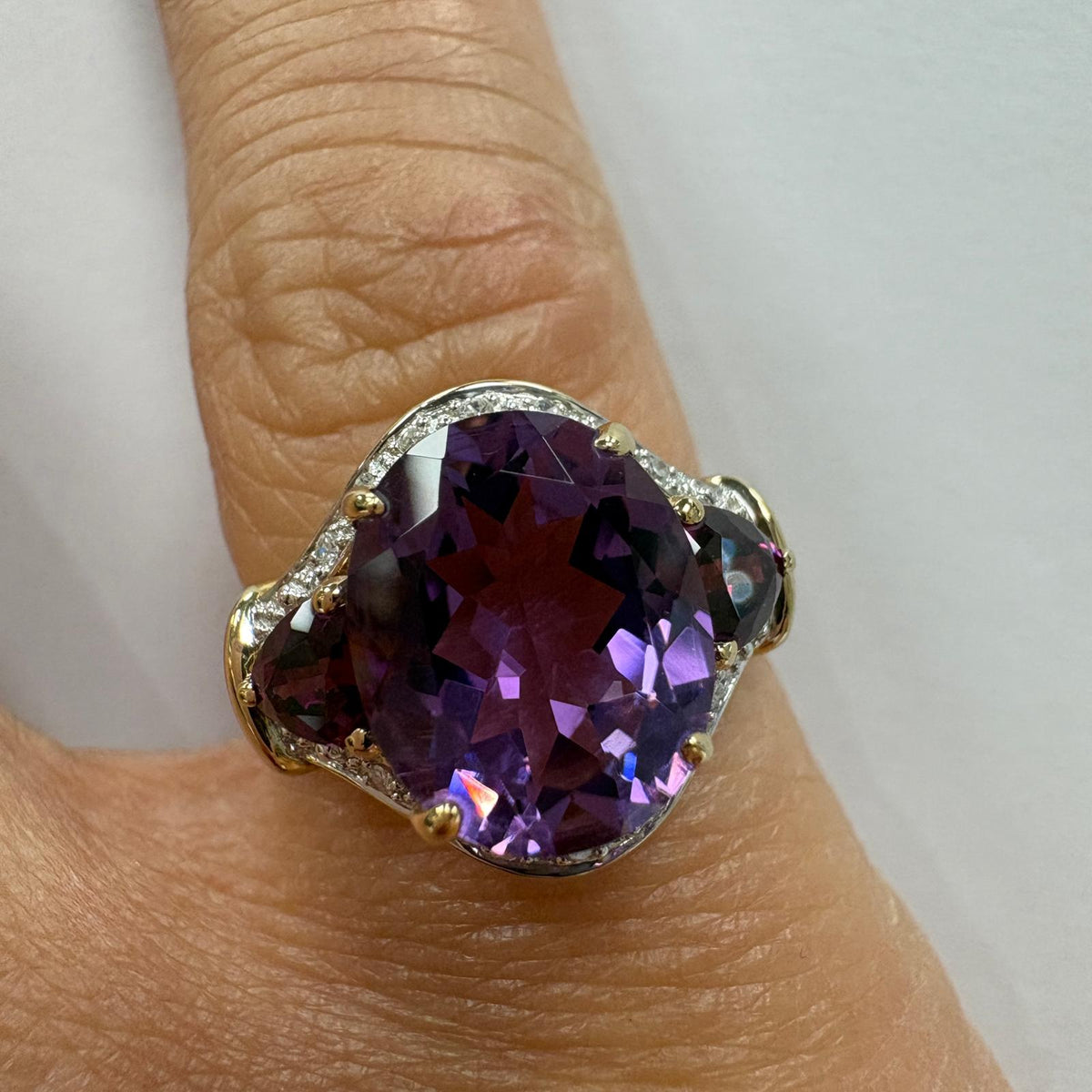 amethyst cocktail ring, large amethyst ring UK, 9ct gold amethyst ring, amethyst and pink sapphire ring, amethyst and diamond ring, pink sapphire cocktail ring, February birthstone ring, purple statement ring