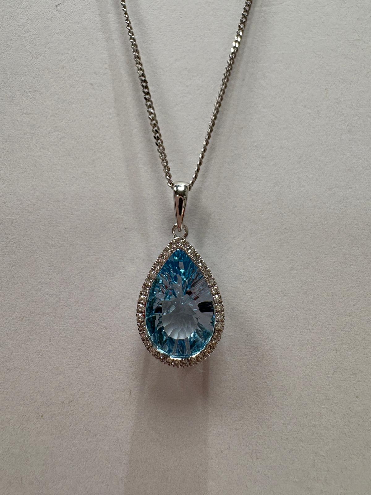 blue topaz diamond pendant, pre-loved white gold necklace, second hand 9ct white gold pendant, topaz halo pendant UK, pre-owned diamond necklace