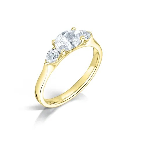 Oval diamond east- west three stone diamond engagement ring set on 18k yellow gold from fogal and barnes fine jewellers of Harrogate. 
