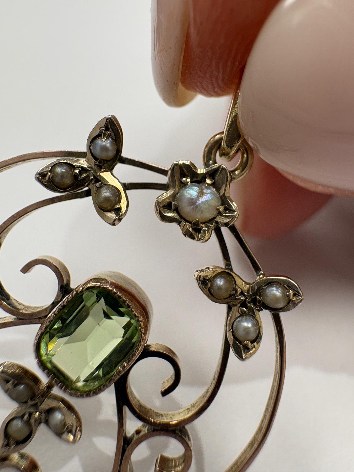 Edwardian openwork gold pendant with green peridot, violet amethyst and white seed pearls
