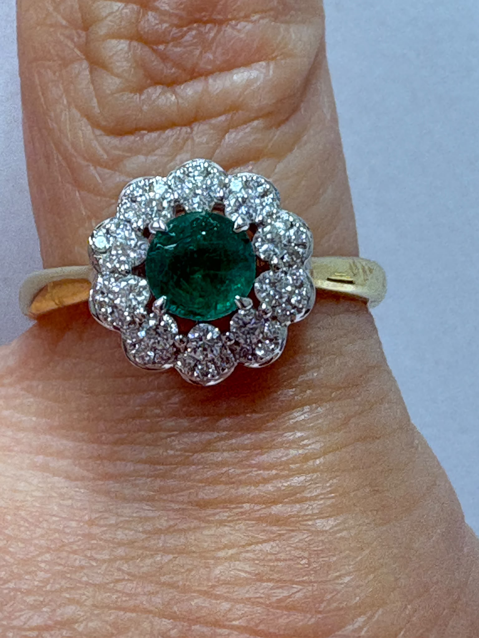 emerald diamond cluster ring, 18ct gold emerald ring, round emerald ring, emerald engagement ring alternative, pre-loved emerald ring UK, emerald cluster ring Harrogate, diamond halo emerald ring, second hand emerald ring size N