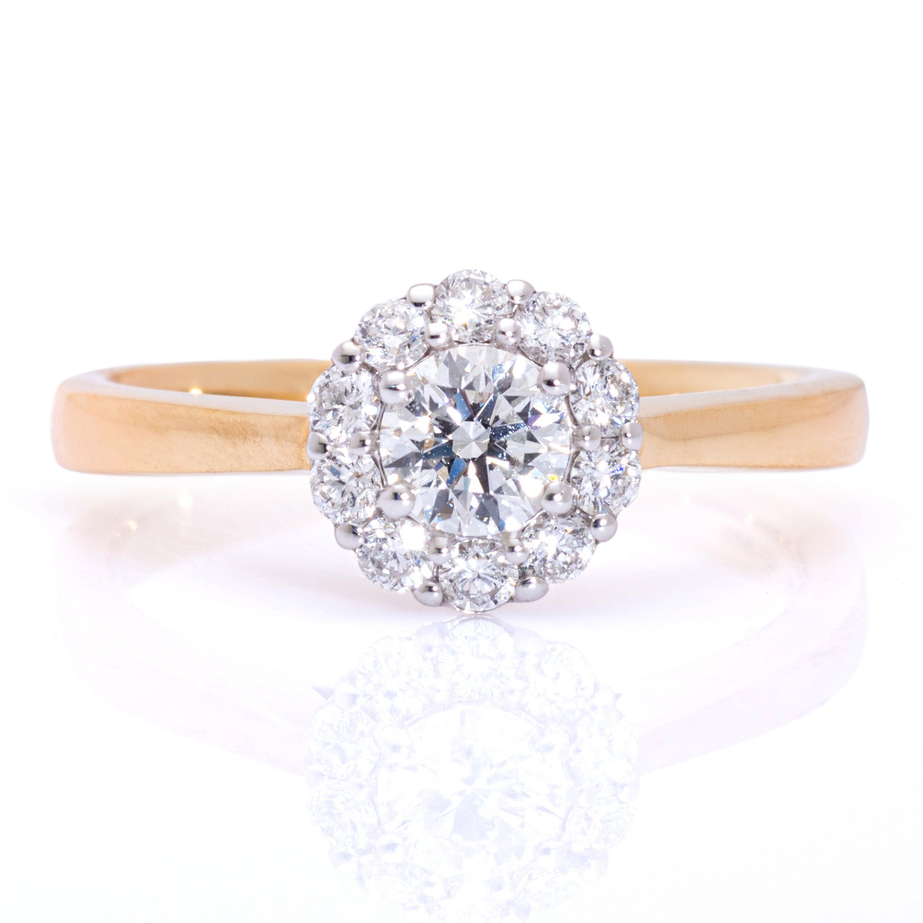 Round brilliant diamond cluster engagement ring yellow gold Harrogate jewellers Fogal and barnes 
