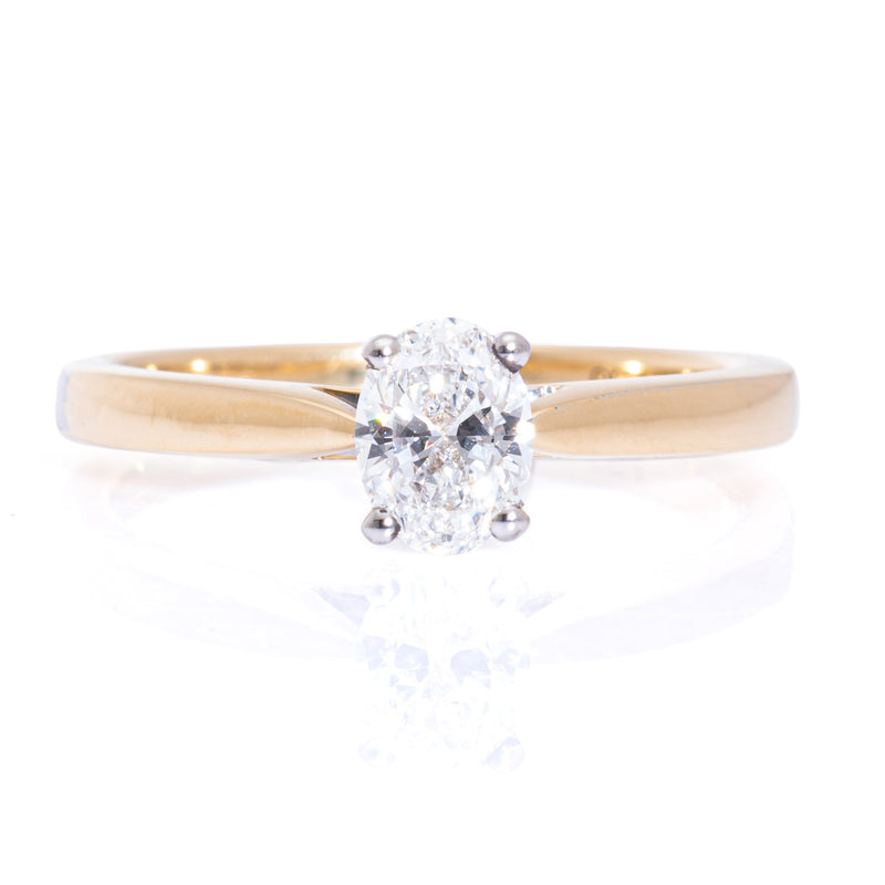 Oval cut diamond solitaire ring white gold claw setting yellow gold band harrogate jewellers fogal and barnes 
