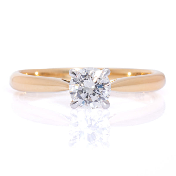 Classic round brilliant diamond solitaire ring claw setting yellow gold band harrogate jewellers fogal and barnes 