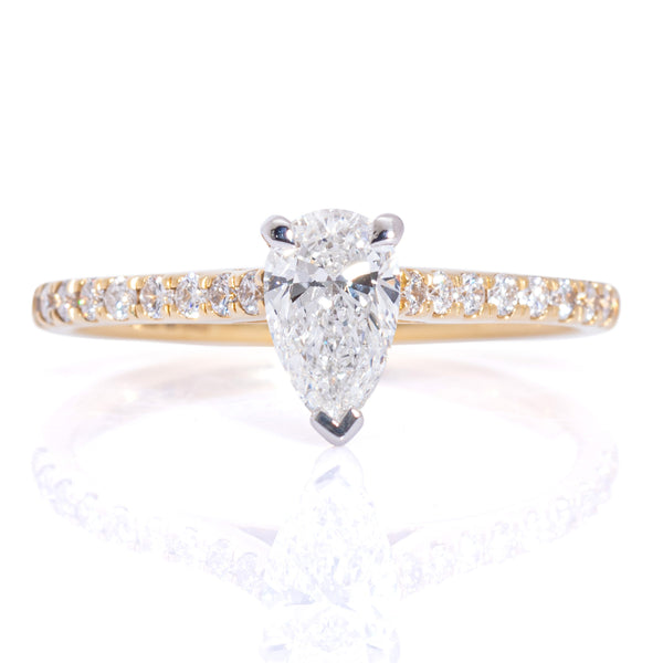 Pear cut diamond solitaire ring diamond set shoulders yellow gold band harrogate jewellers fogal and barnes 