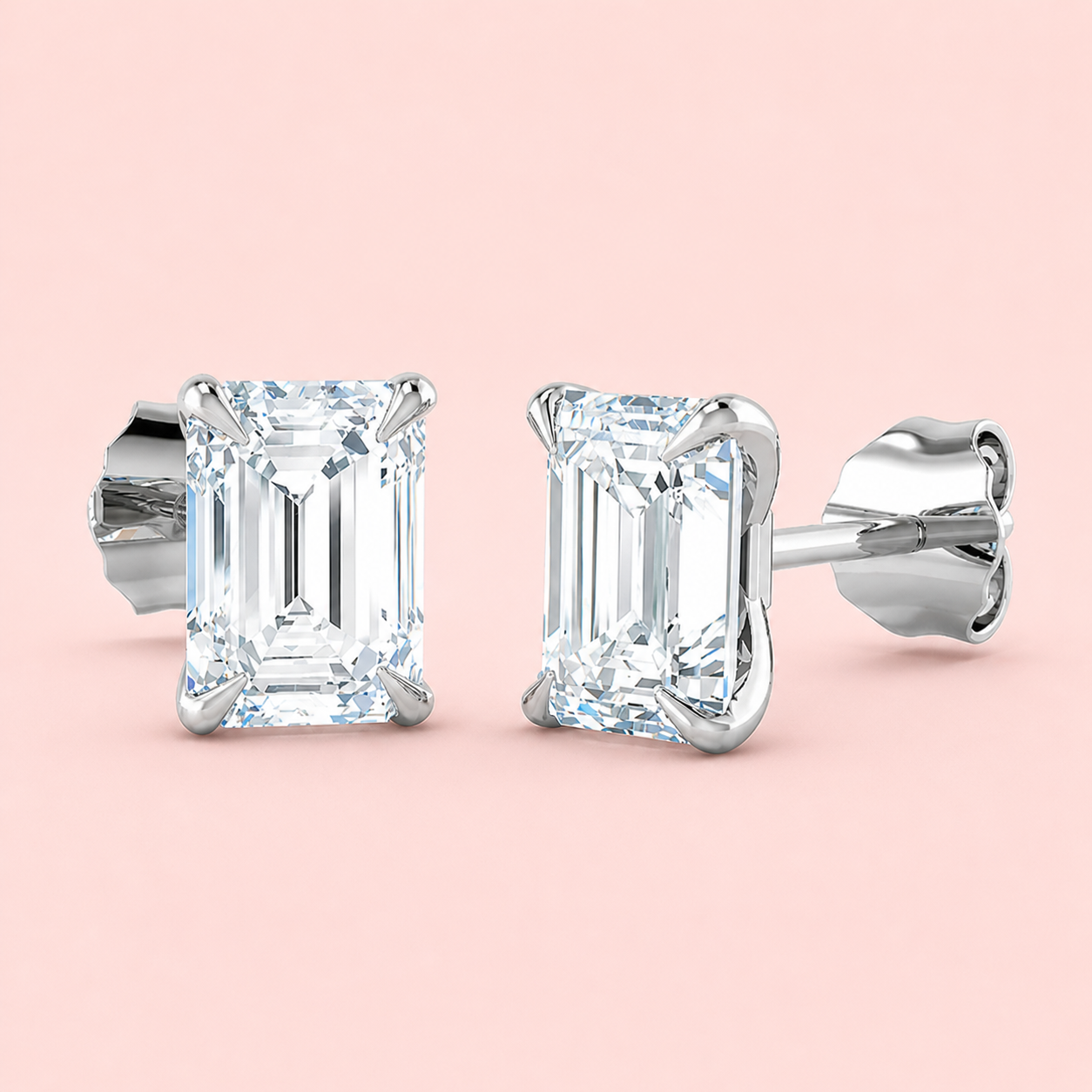 Lab-grown emerald cut diamond stud earrings in 18ct white gold, four-claw F VS, 1.09ct total, made to order at Fogal & Barnes Harrogate