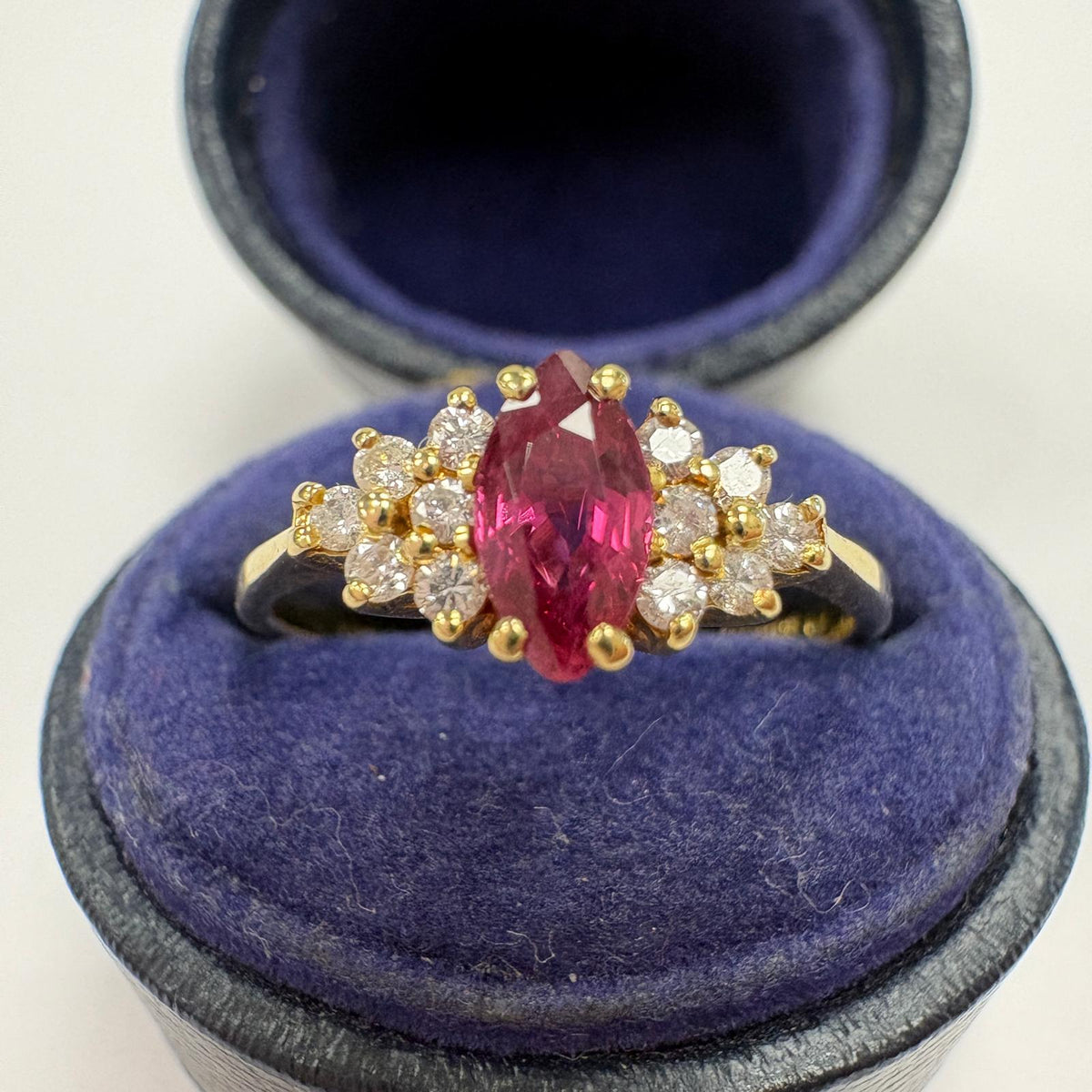 marquise ruby ring, ruby and diamond ring UK, 18ct gold ruby ring, marquise cluster ring, alternative engagement ring, ruby anniversary ring, July birthstone ring, pre-loved ruby ring