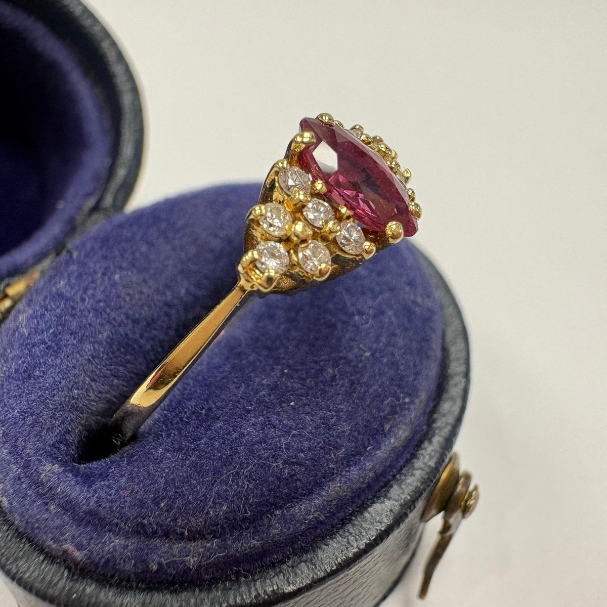 marquise ruby ring, ruby and diamond ring UK, 18ct gold ruby ring, marquise cluster ring, alternative engagement ring, ruby anniversary ring, July birthstone ring, pre-loved ruby ring