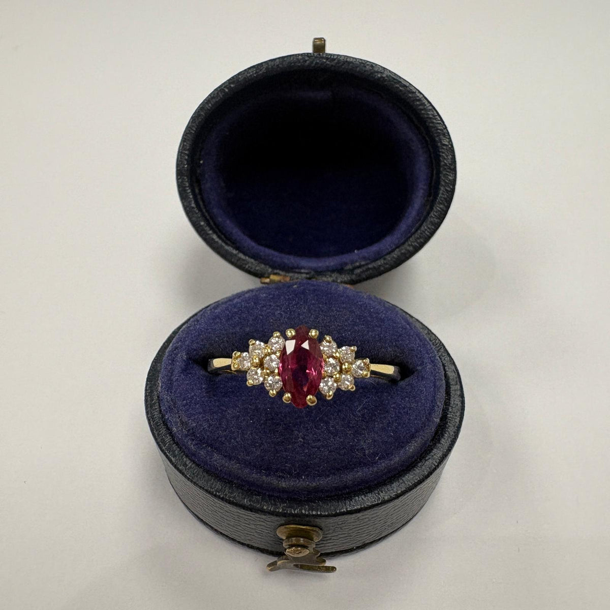 marquise ruby ring, ruby and diamond ring UK, 18ct gold ruby ring, marquise cluster ring, alternative engagement ring, ruby anniversary ring, July birthstone ring, pre-loved ruby ring