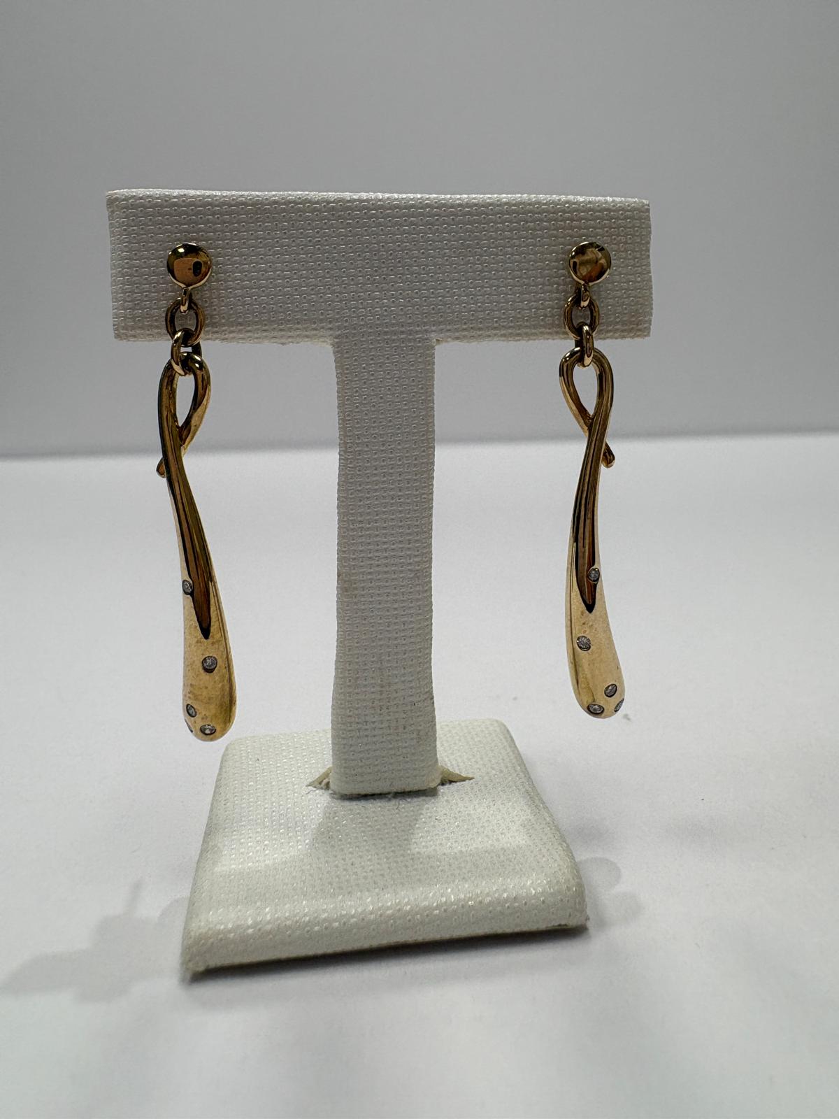 pre-loved diamond drop earrings, second hand 9ct gold earrings, gold diamond drops, pre-owned gold earrings UK, sculptural drop earrings