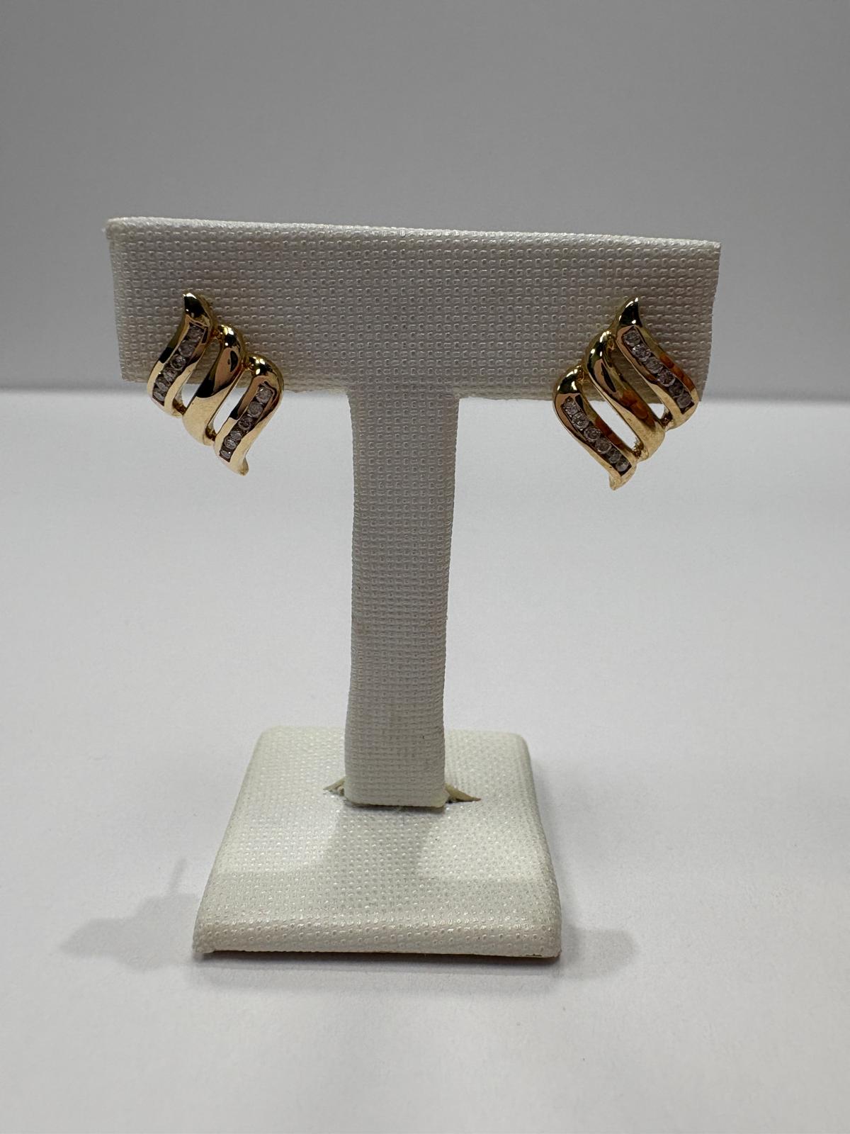 pre-loved diamond earrings, second hand 9ct gold earrings, diamond wave earrings, pre-owned gold earrings UK, channel set diamond studs