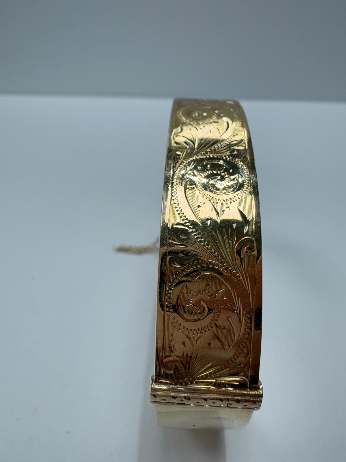 pre-loved gold bangle, vintage engraved bangle, second hand 9ct gold bangle UK, antique style hinged bangle, pre-owned gold jewellery, Victorian style bangle, vintage bangle for sale UK, second hand fine jewellery UK, hand engraved gold bangle