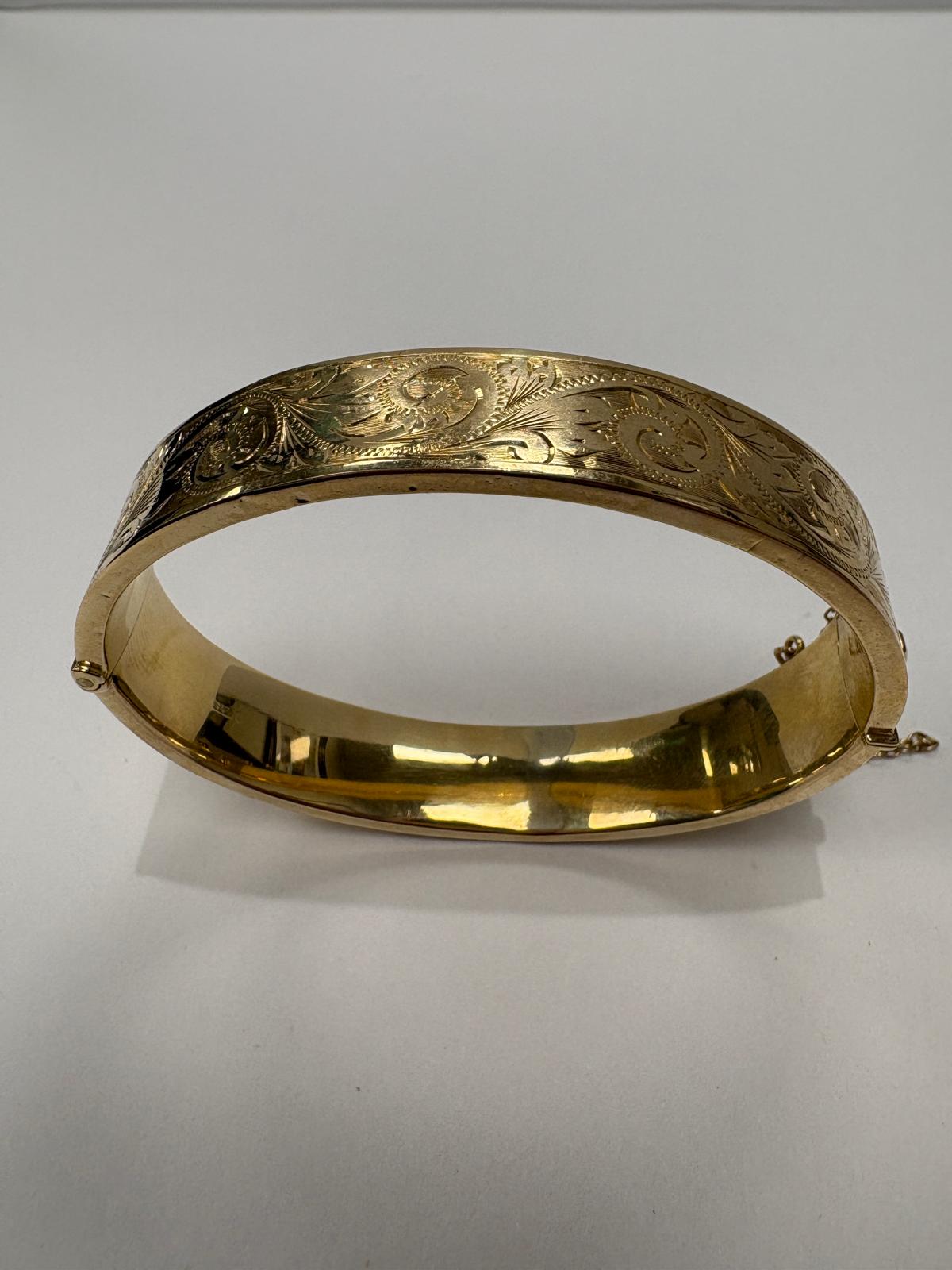 pre-loved gold bangle, vintage engraved bangle, second hand 9ct gold bangle UK, antique style hinged bangle, pre-owned gold jewellery, Victorian style bangle, vintage bangle for sale UK, second hand fine jewellery UK, hand engraved gold bangle