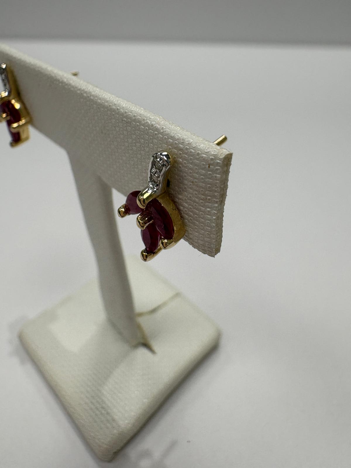 pre-loved ruby earrings, second hand 9ct gold earrings UK, ruby diamond flower earrings, marquise ruby studs, pre-owned gemstone earrings, second hand fine jewellery UK, red ruby earrings for sale UK