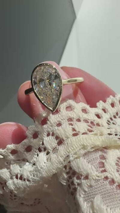 Lab-grown diamond engagement ring pear shape bezel yellow gold Harrogate Jewellers 
