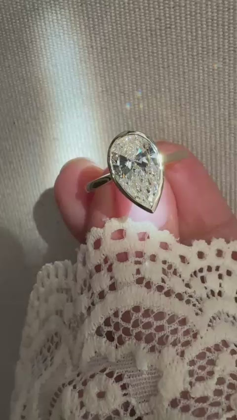 Pear cut Lab-grown diamond bezel set engagement ring Harrogate Jewellers 
