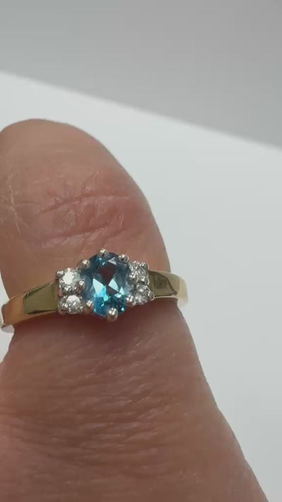 Oval Blue Topaz with diamond sides set on 9k yellow gold vintage second hand jewellers uk harrogate 