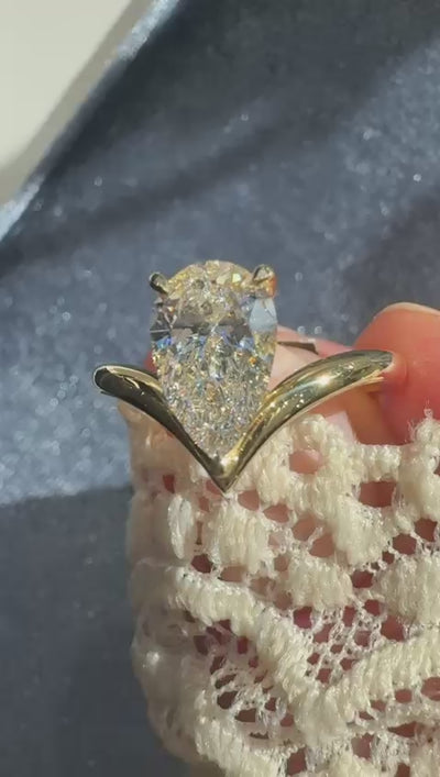 Pear shape lab grown diamond engagement ring Harrogate Jewellers Fogal and Barnes Wishbone band unique 