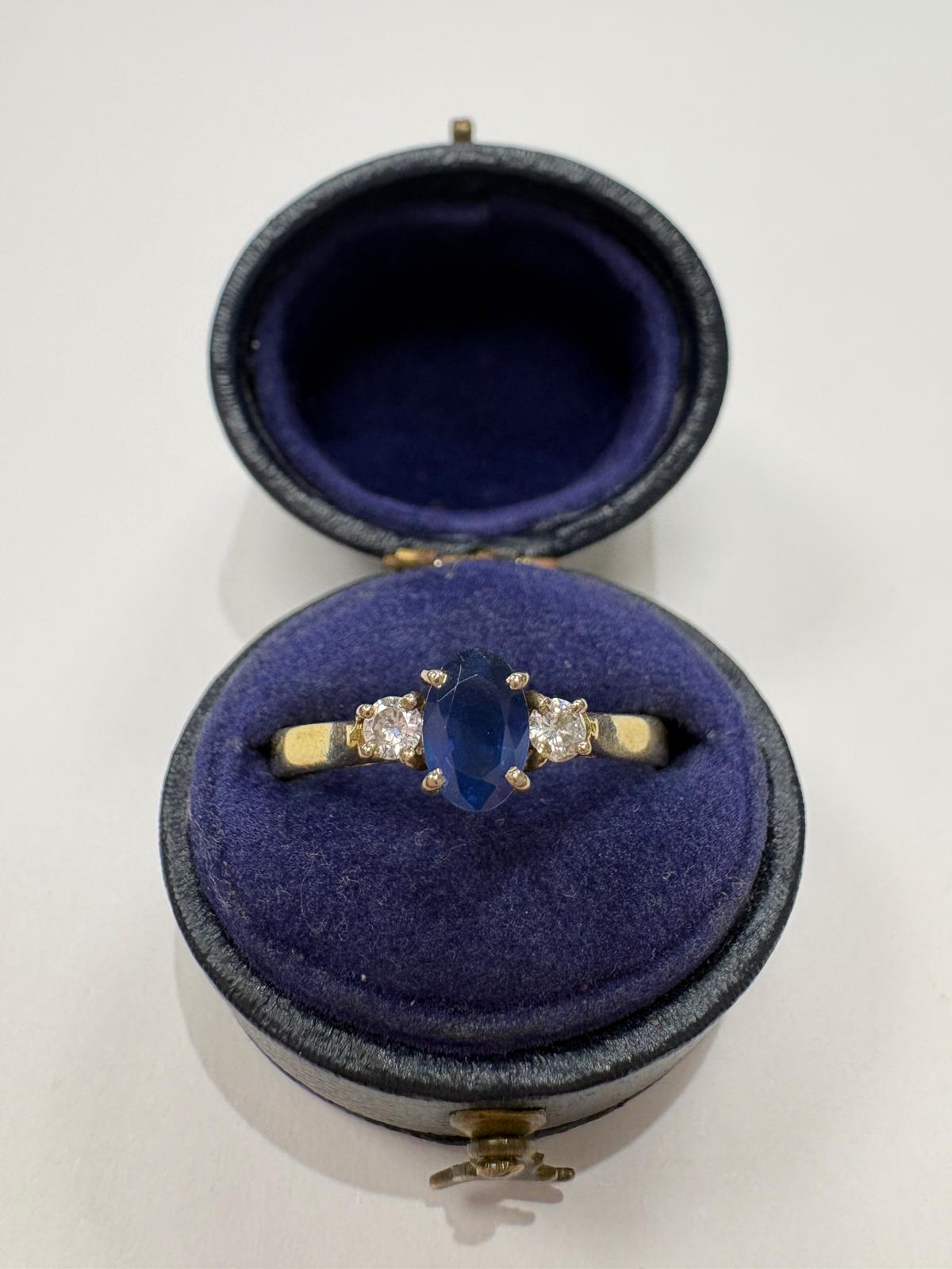 sapphire and diamond ring, three stone sapphire ring, 18ct gold sapphire ring, second hand sapphire ring UK, pre-loved sapphire ring, vintage sapphire ring, oval sapphire ring, September birthstone ring, sapphire trilogy ring, second hand jewellery Harrogate, second hand jewellery Leeds, second hand jewellery York, second hand jewellery Yorkshire, pre-owned sapphire ring UK,