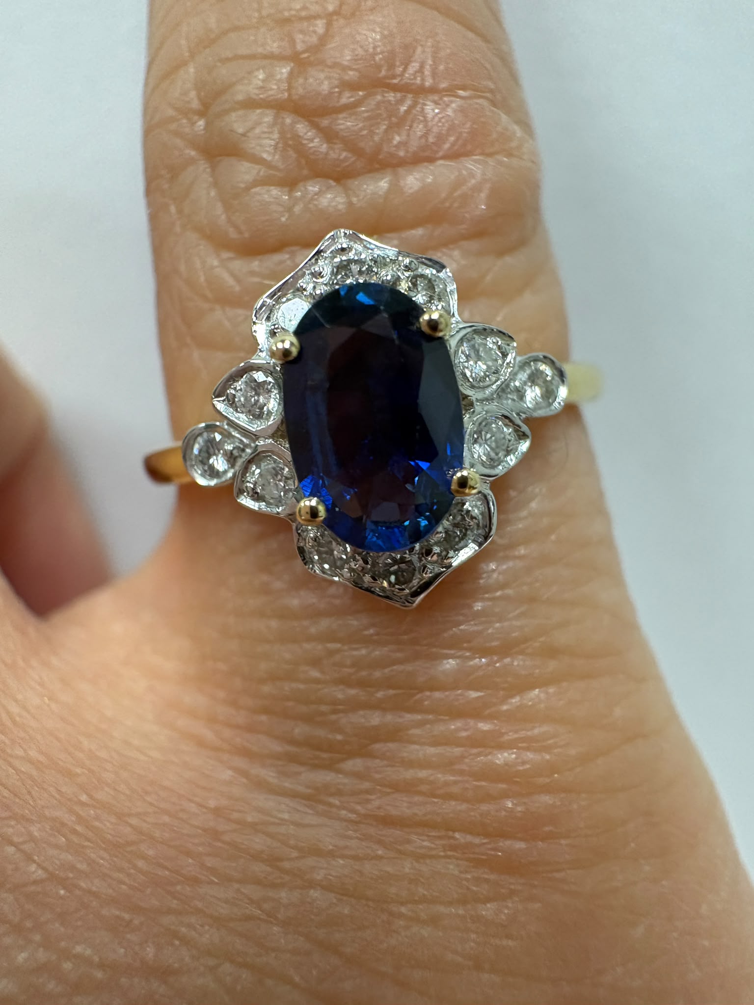 sapphire diamond cluster ring, vintage sapphire engagement ring, pre-loved 18ct gold ring Harrogate, sapphire halo ring Yorkshire, second hand engagement ring Leeds York