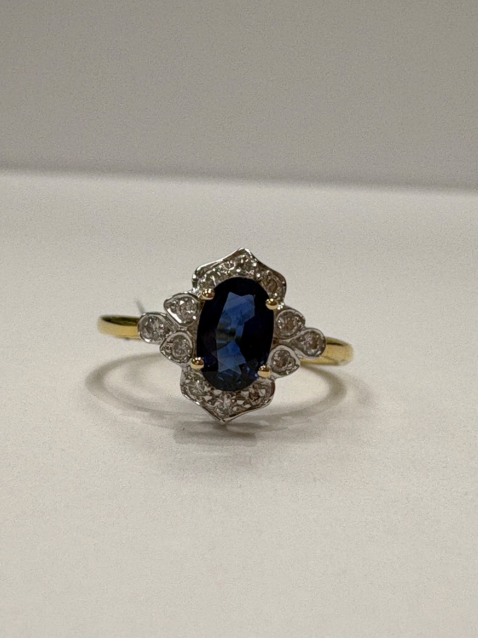 sapphire diamond cluster ring, vintage sapphire engagement ring, pre-loved 18ct gold ring Harrogate, sapphire halo ring Yorkshire, second hand engagement ring Leeds York