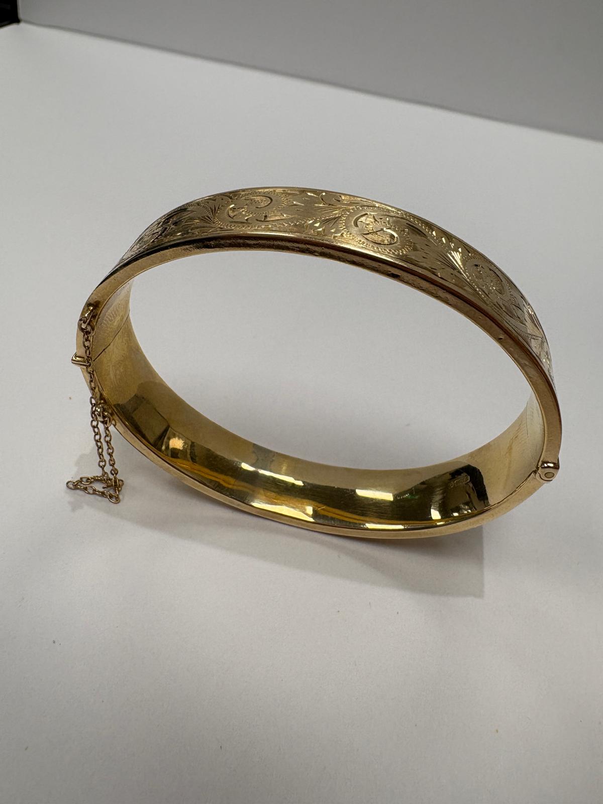 pre-loved gold bangle, vintage engraved bangle, second hand 9ct gold bangle UK, antique style hinged bangle, pre-owned gold jewellery, Victorian style bangle, vintage bangle for sale UK, second hand fine jewellery UK, hand engraved gold bangle