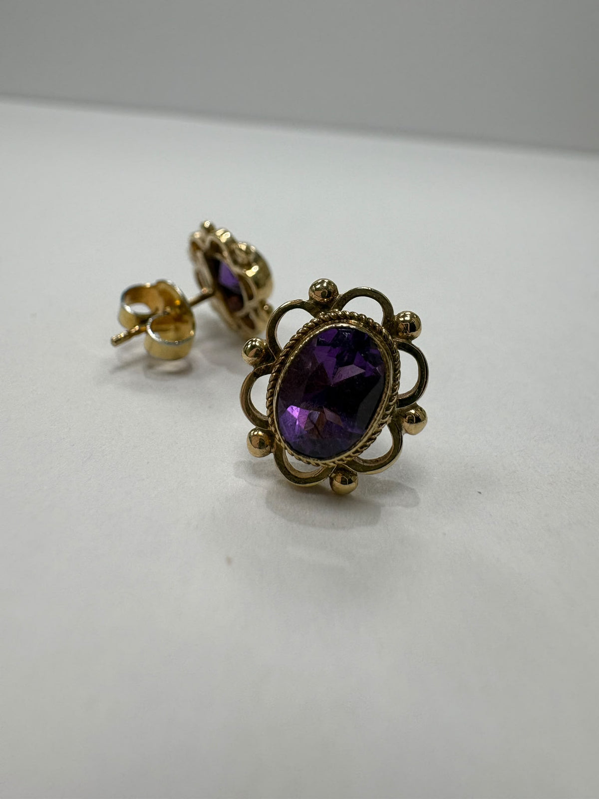 vintage amethyst earrings, pre-loved gold amethyst studs, second hand 9ct gold earrings UK, antique style amethyst earrings, purple gemstone studs Harrogate 