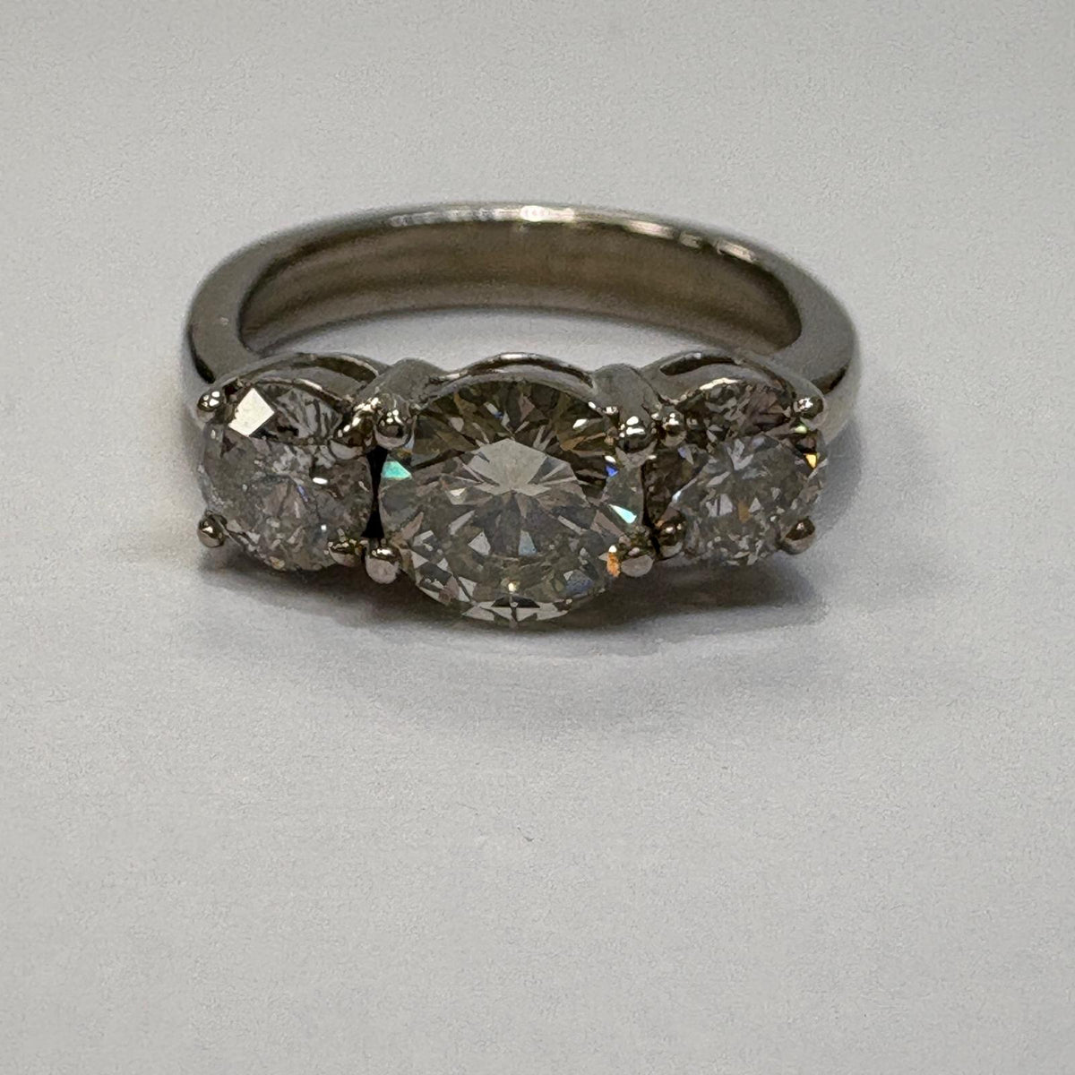 three stone diamond ring, trilogy diamond ring UK, platinum diamond ring, pre-loved engagement ring, second hand diamond ring, 1.5 carat diamond ring, anniversary diamond ring, pre-owned trilogy ring
