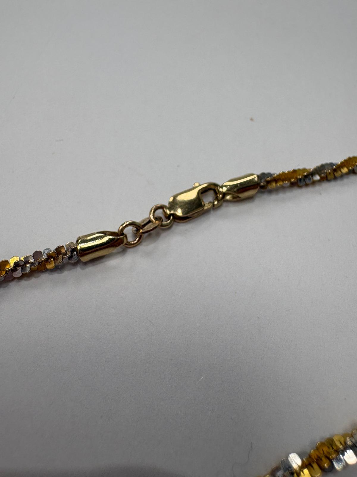 Lobster clasp detail on 9ct two-tone gold necklace