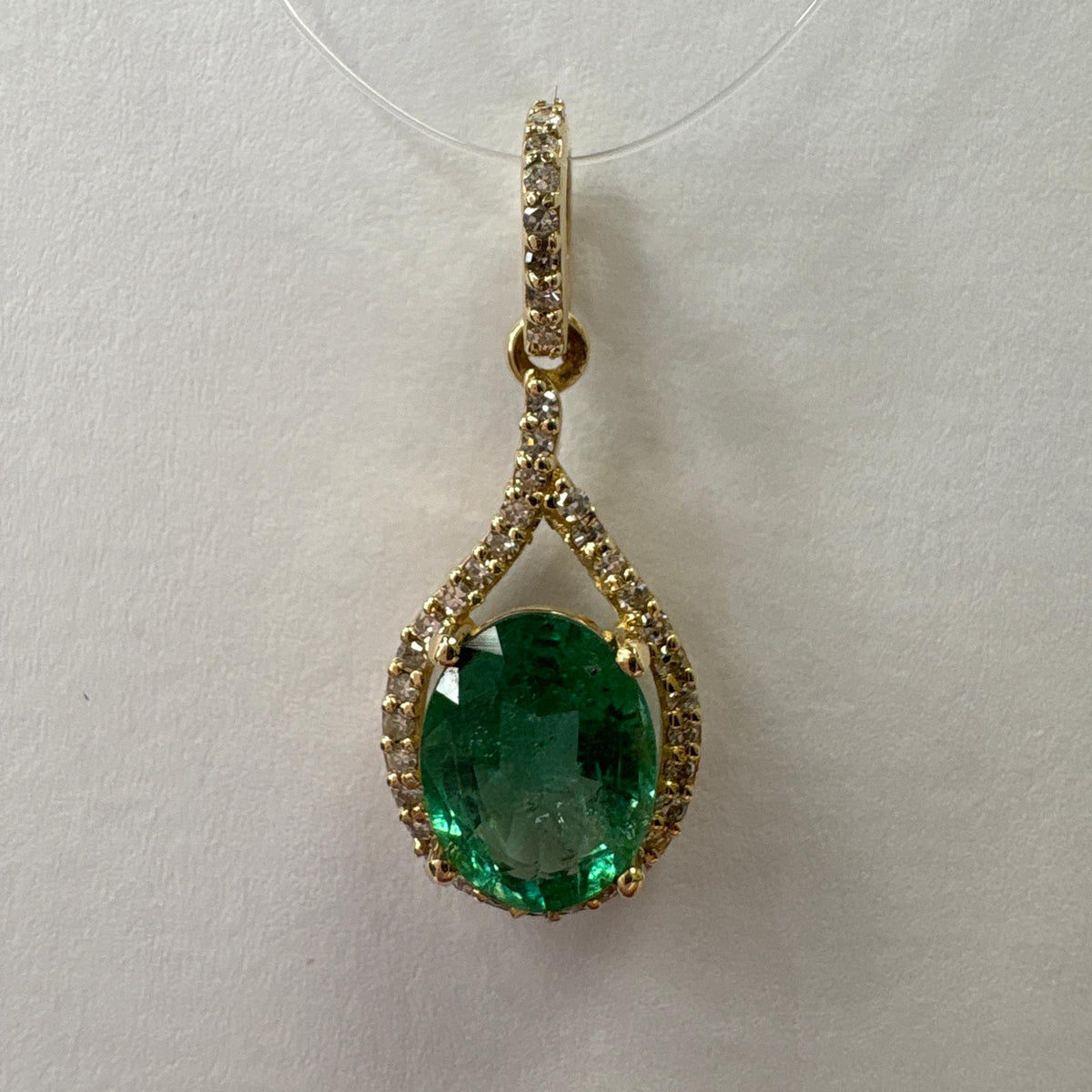 emerald pendant UK, emerald and diamond pendant, certified emerald pendant, 14ct gold emerald necklace, emerald halo pendant, May birthstone pendant, natural emerald pendant, pre-loved emerald pendant