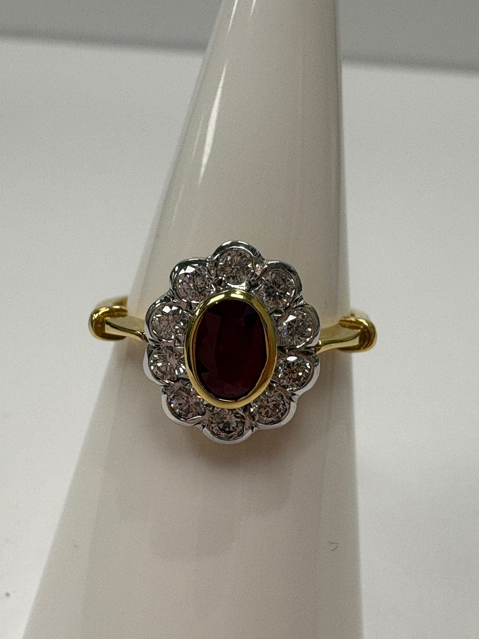 vintage ruby diamond ring, 18ct gold ruby cluster ring, oval ruby ring, ruby engagement ring alternative, pre-loved ruby ring UK, vintage cluster ring Harrogate, diamond halo ruby ring, second hand ruby ring size N