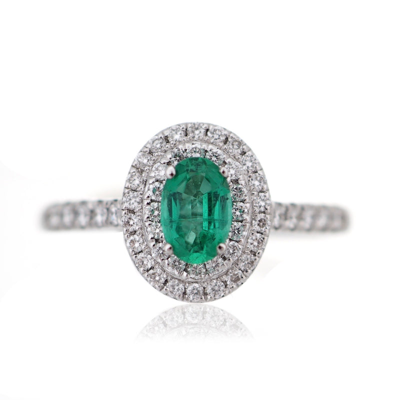 Oval cut Emerald and Diamond double Halo engagement ring white gold  Harrogate Jewellers Fogal and Barnes