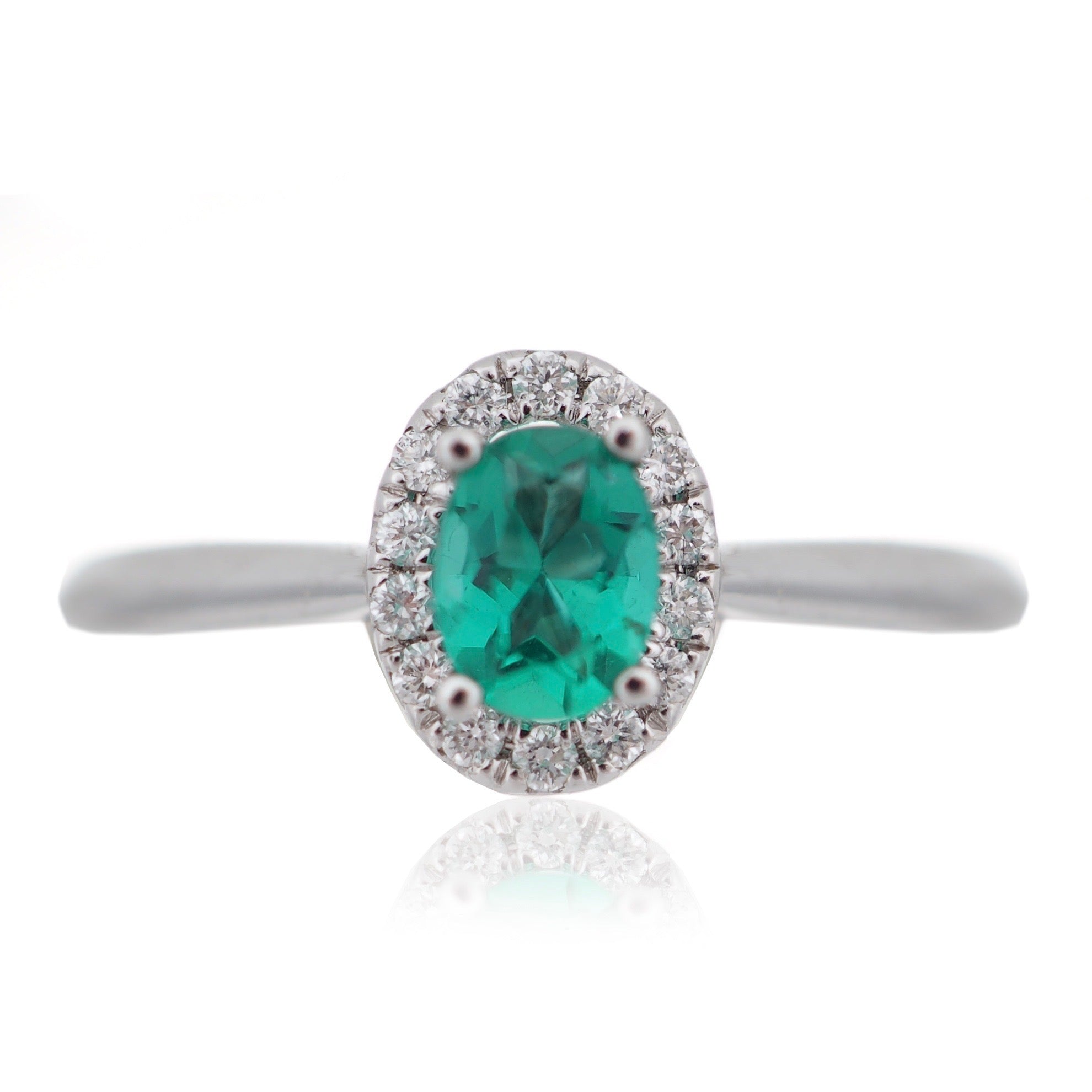 Oval cut Emerald and Diamond Halo engagement ring White Gold Harrogate Jewellers Fogal and Barnes