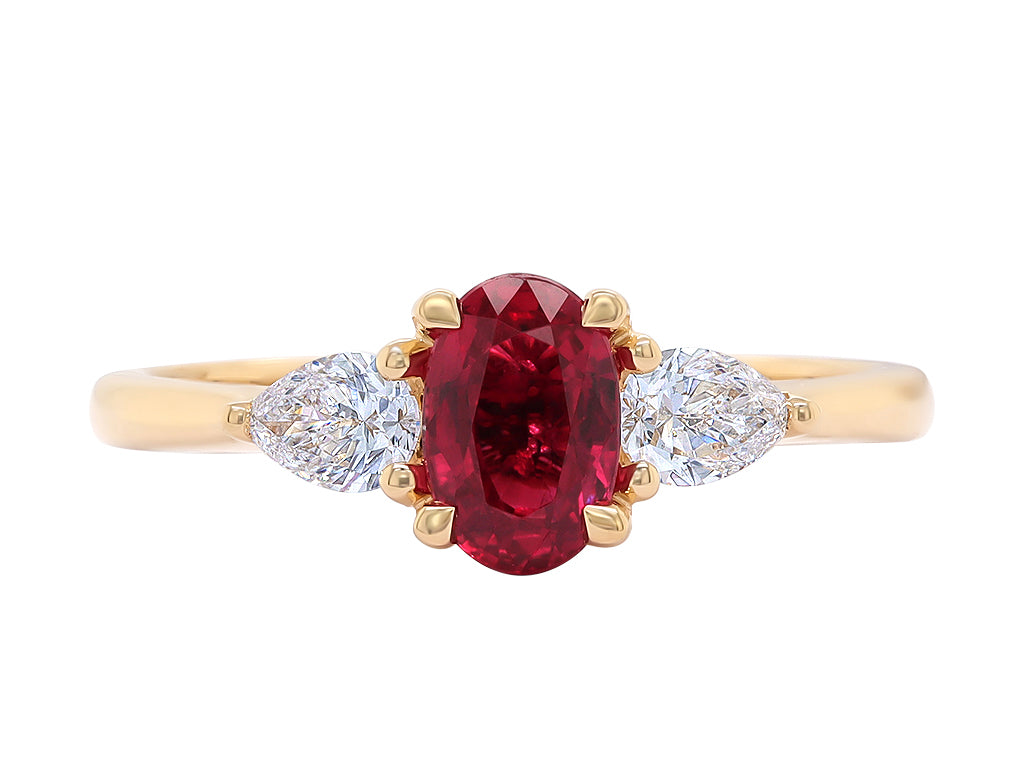 Oval Ruby and round brilliant diamond trilogy engagement ring yellow gold Harrogate jewellers Fogal and Barnes Harrogate 