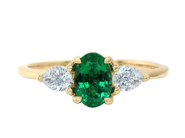Oval cut Emerald and Pear Diamond Trilogy engagement ring Yellow Gold Harrogate Jewellers Fogal and Barnes