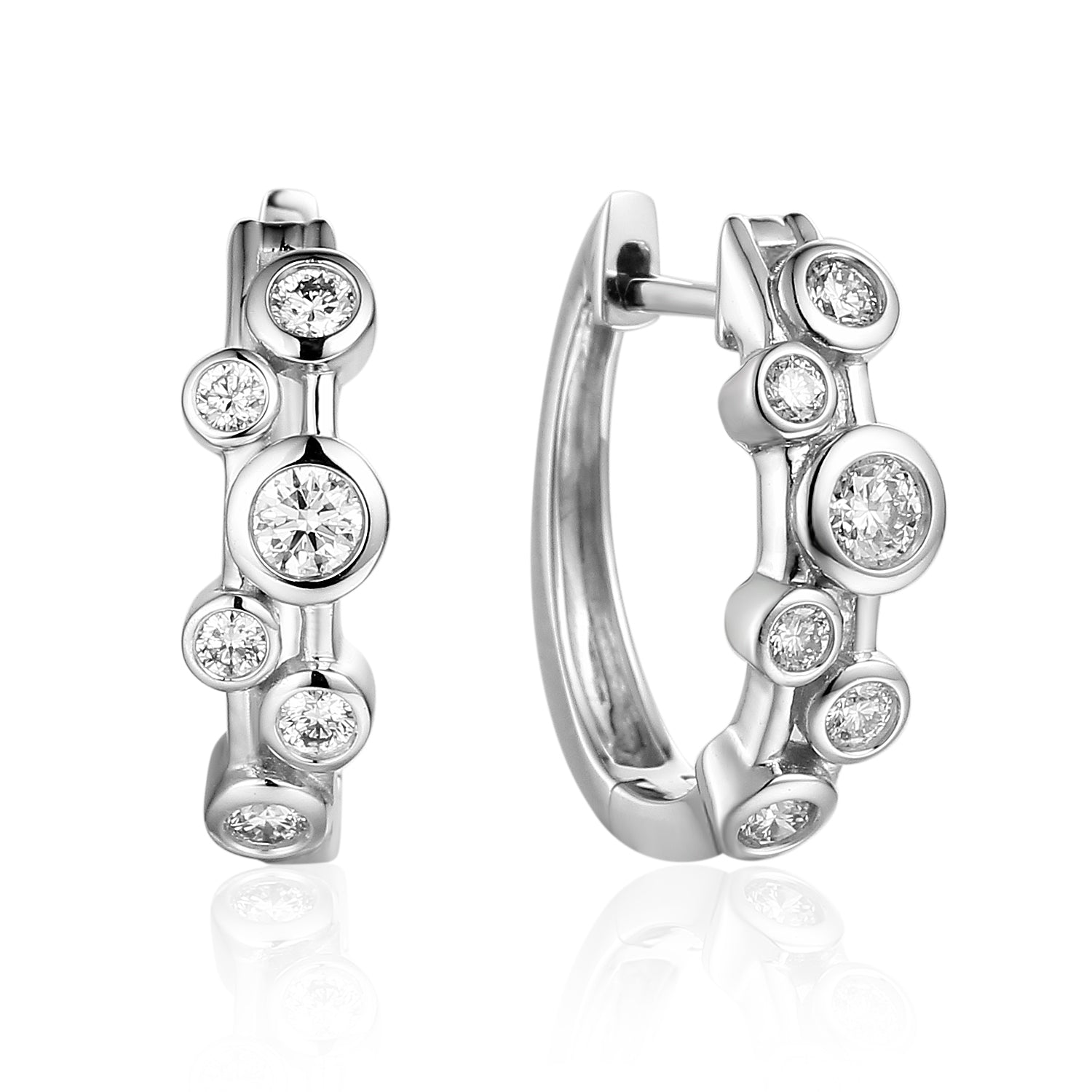 Raindrop design round brilliant diamond hooped earrings rub over setting white gold Harrogate jewellers Fogal and barnes 