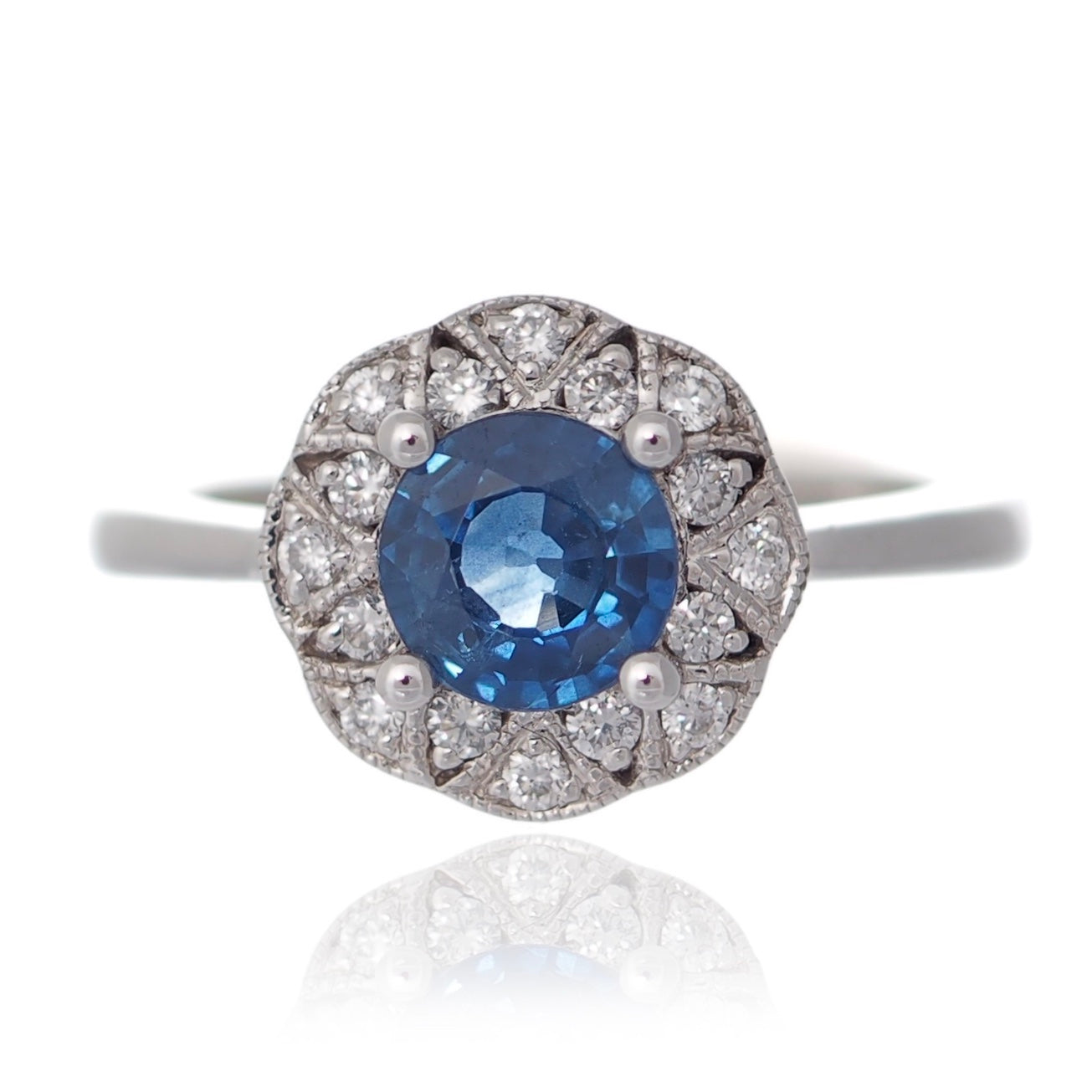 Sapphire and Diamond vintage style engagement ring platinum flower design Fogal and Barnes Harrogate Jewellers