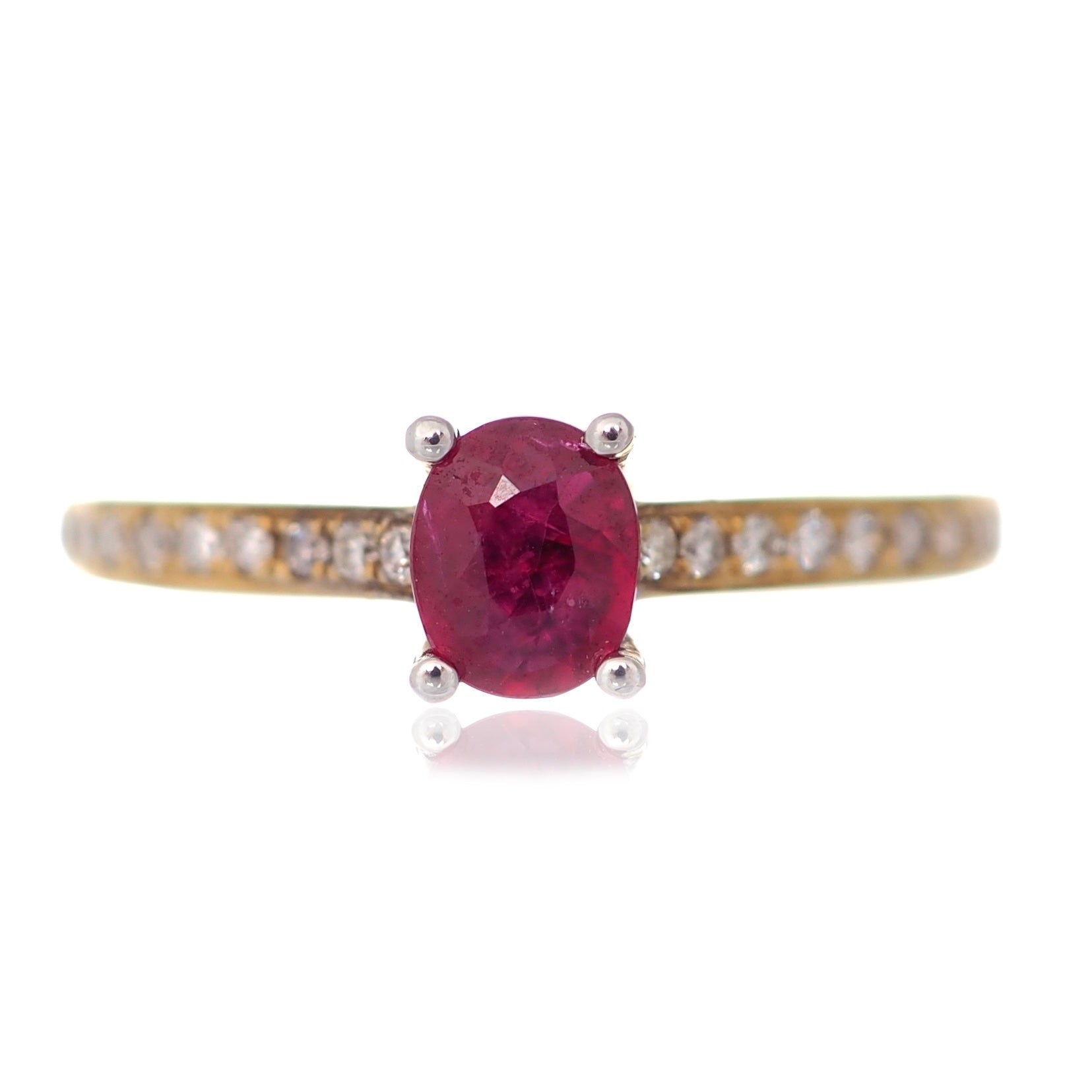 Oval Ruby solitaire engagement ring diamond shoulders yellow gold Harrogate jewellers Fogal and barnes