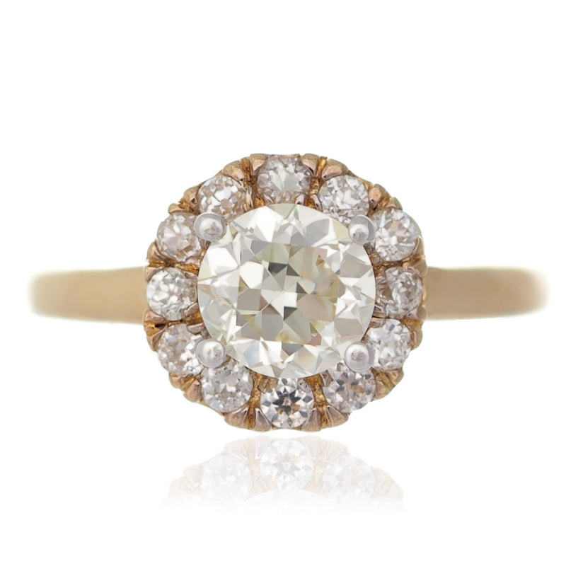 Brilliant round diamond halo engagement ring flower setting yellow gold Harrogate jewellers Fogal and barnes 