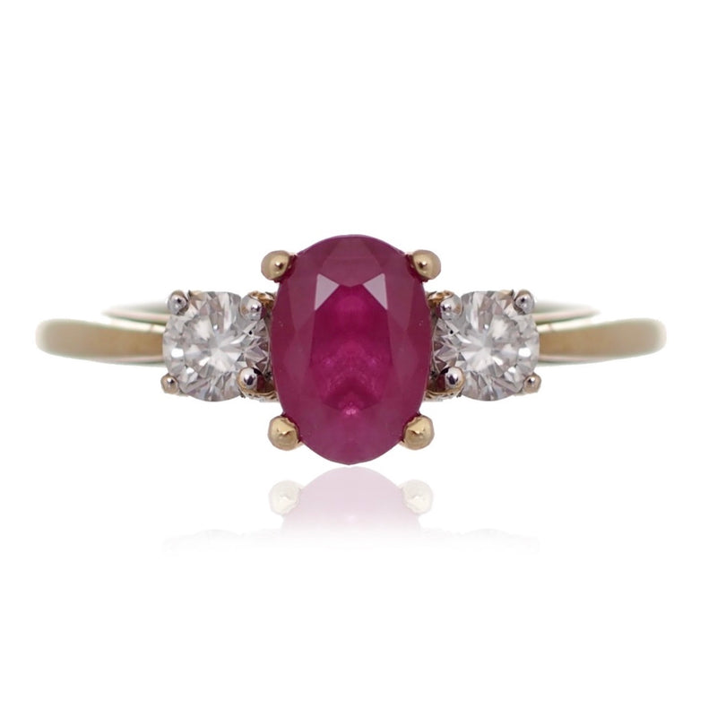 Oval Ruby and diamond trilogy engagement ring yellow gold Harrogate jewellers Fogal and barnes 