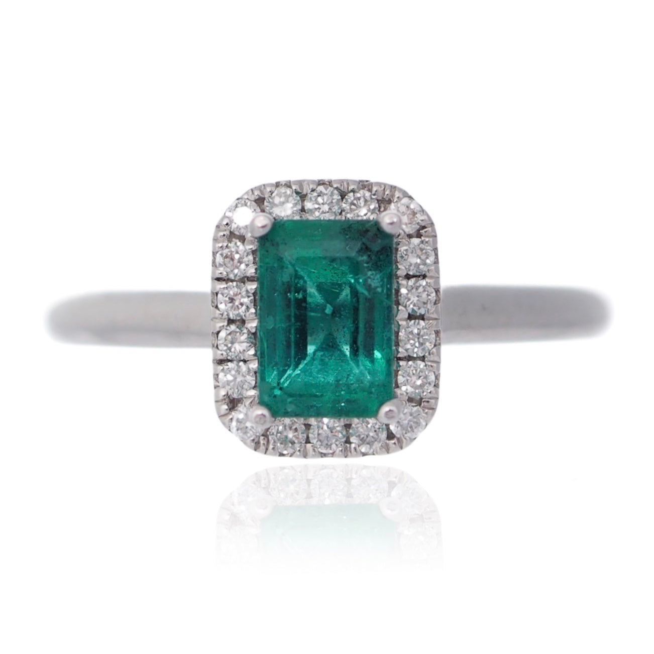 Emerald cut Emerald and Diamond Halo engagement ring White gold Harrogate jewellers Fogal and Barnes